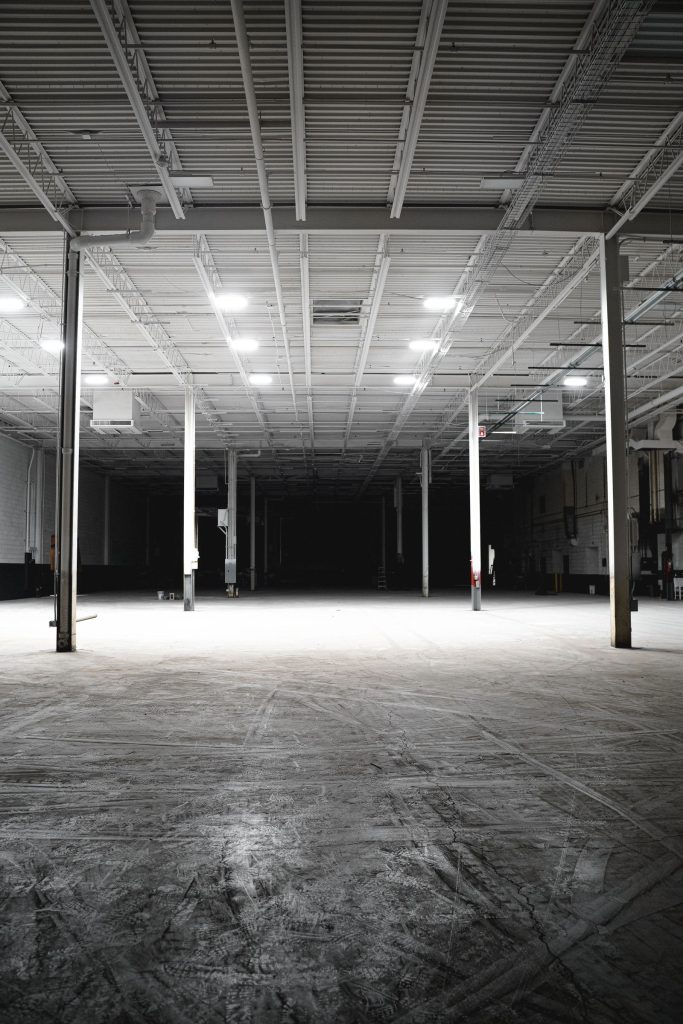 Empty commercial space with trenched sanitary lines ready for build-out